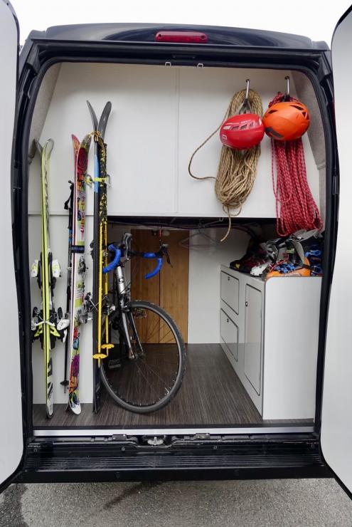 garage with mountain gear and bike